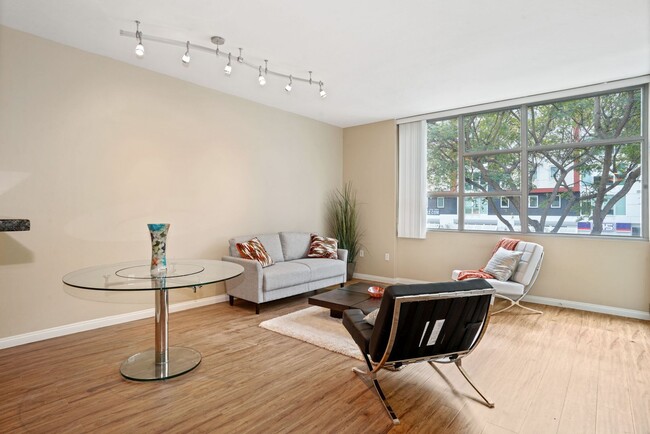 Building Photo - Gorgeous open, supersized 1/BR features a ...