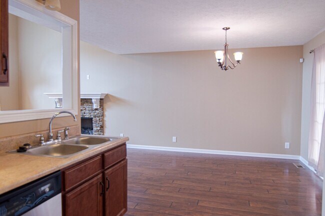 Building Photo - Pet Friendly Three Bedroom with Bonus!