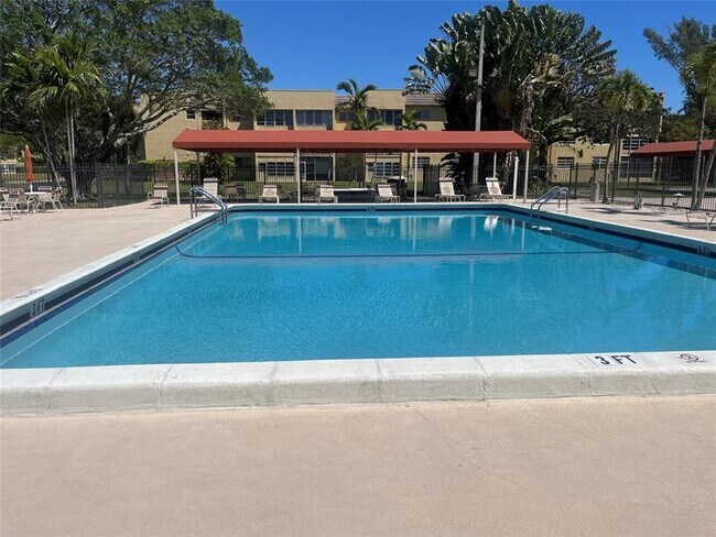 Building Photo - 6090 NW 64th Ave