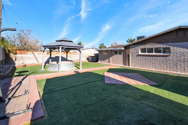 Building Photo - Single Story,  Totally Renovated , 3 bedroom, 2 bathroom Home with  extensive privacy and gated h...