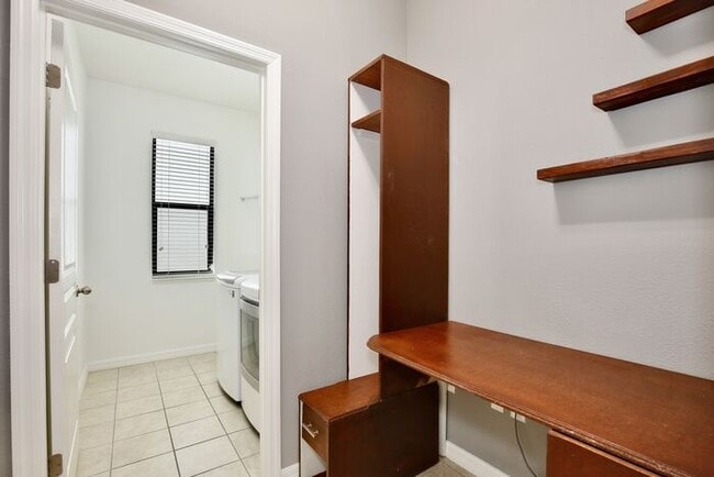 Building Photo - Stylish 4/3 Home with Covered Patio & Gara...