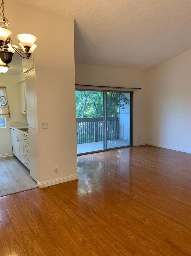 Building Photo - Bright, comfortable, and spacious one bedroom Condominium