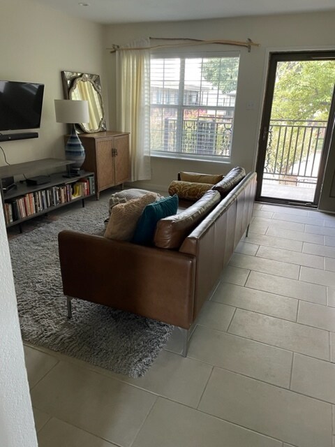 Space has greenery outside each window with Crape Myrtle trees around pool - 3131 Southwest Fwy