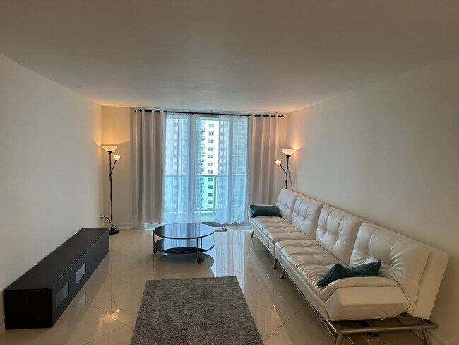 Building Photo - 19380 Collins Ave