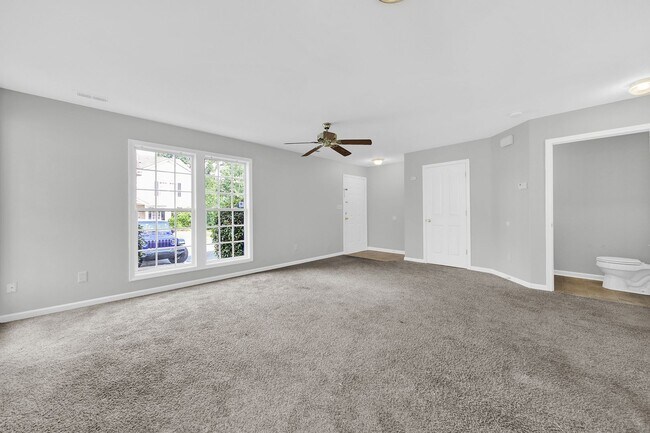 Building Photo - Two-story Condominium with Easy Highway Ac...