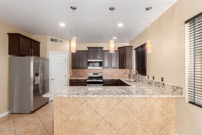 Building Photo - 8721 E Lomita Cir