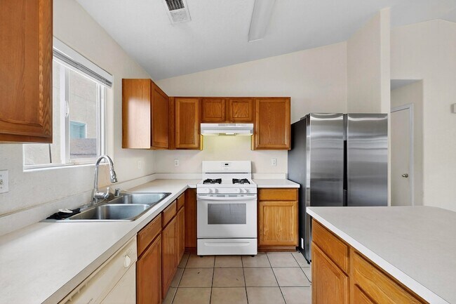 Building Photo - 9000 Violet Orchid Tr SW