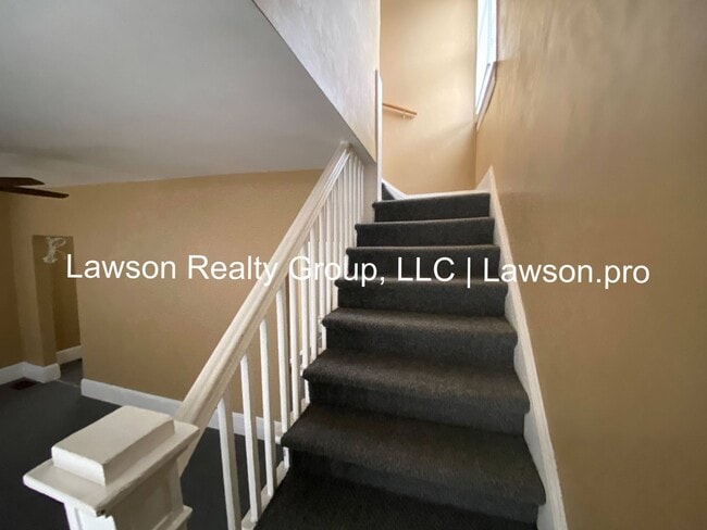 Building Photo - Updated Three Bedroom with Flat Yard