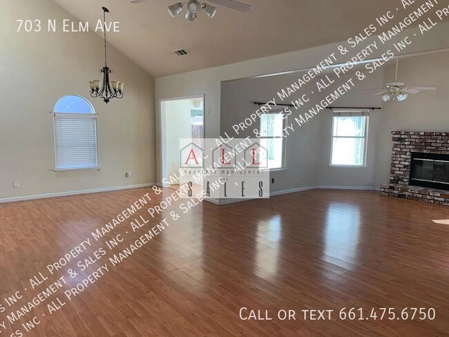 Building Photo - 703 N Elm Ave