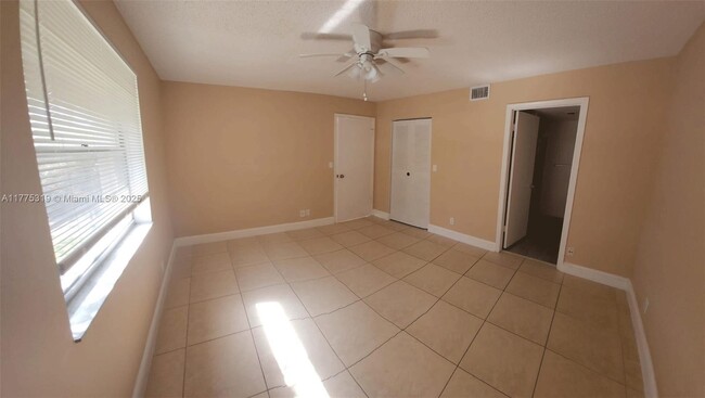 Building Photo - 8750 Royal Palm Blvd