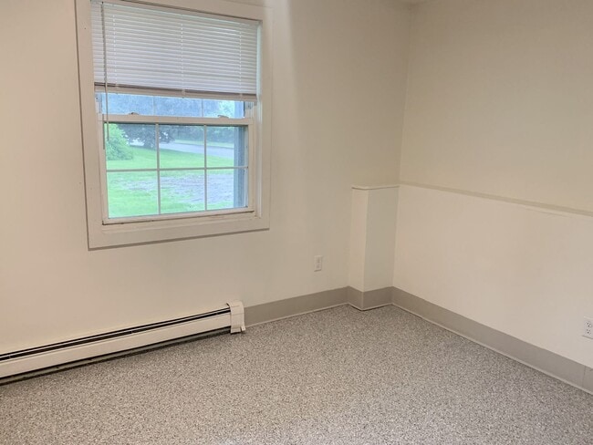 Building Photo - Spacious 3-Bedroom Apartment Near UVM with Private Entrance & Parking