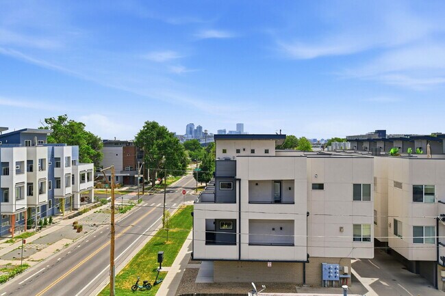 Building Photo - $2,890.95, 2-bed, 2.5-bath, located in Denver with a rooftop terrace.