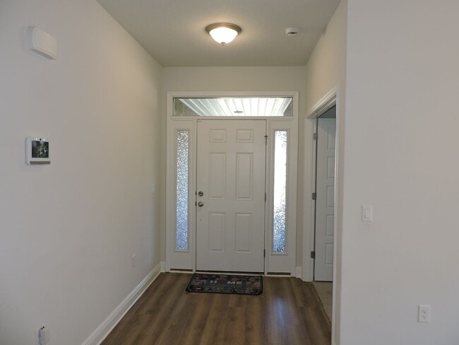 Building Photo - Almost new four bedroom home with solar pa...