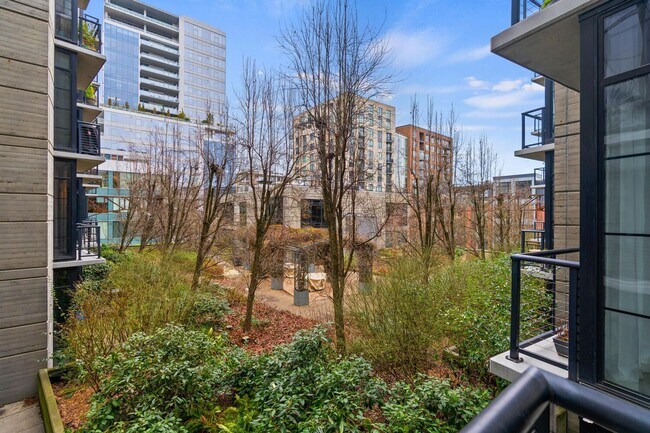 Building Photo - **FURNISHED** Streetcar Lofts studio w/parking/storage/Juliette balcony/fitness center/courtyard ...