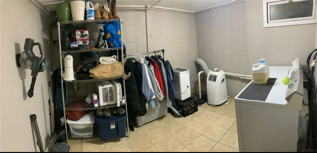 Storage area with in unit washing machines - 726 Cliff St