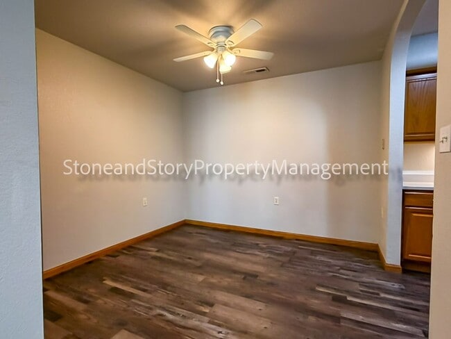 Building Photo - 2 bedroom 1.5 bath duplex with sunroom, 2 car garage and fenced yard