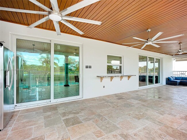 Building Photo - 9641 W Calusa Club Dr