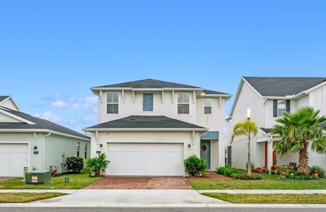 Building Photo - Water Front Home- 4 Large Bedrooms-3 baths Gated Community Call Sheila Campbell 407-687-7900