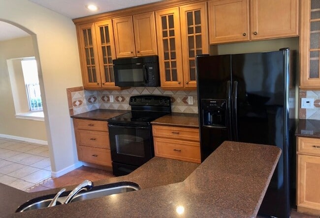 Building Photo - EAGLE CREEK LAKE NONA! WELCOME HOME! Beautiful water views! Spacious 2 story-3 bedroom 2.5 bath h...