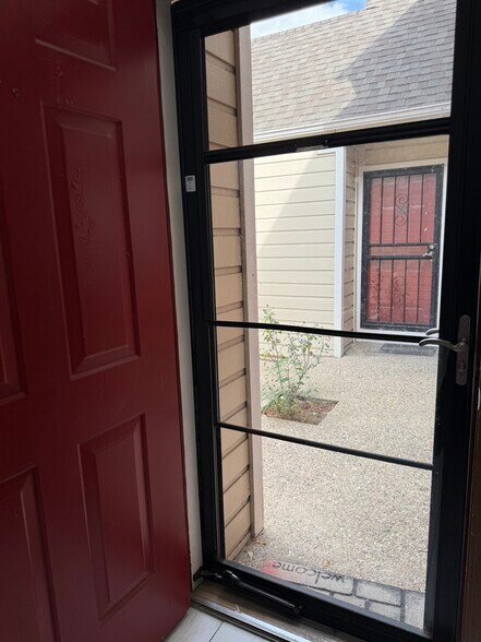 Convenient Storm Door - 7474 E Arkansas Ave
