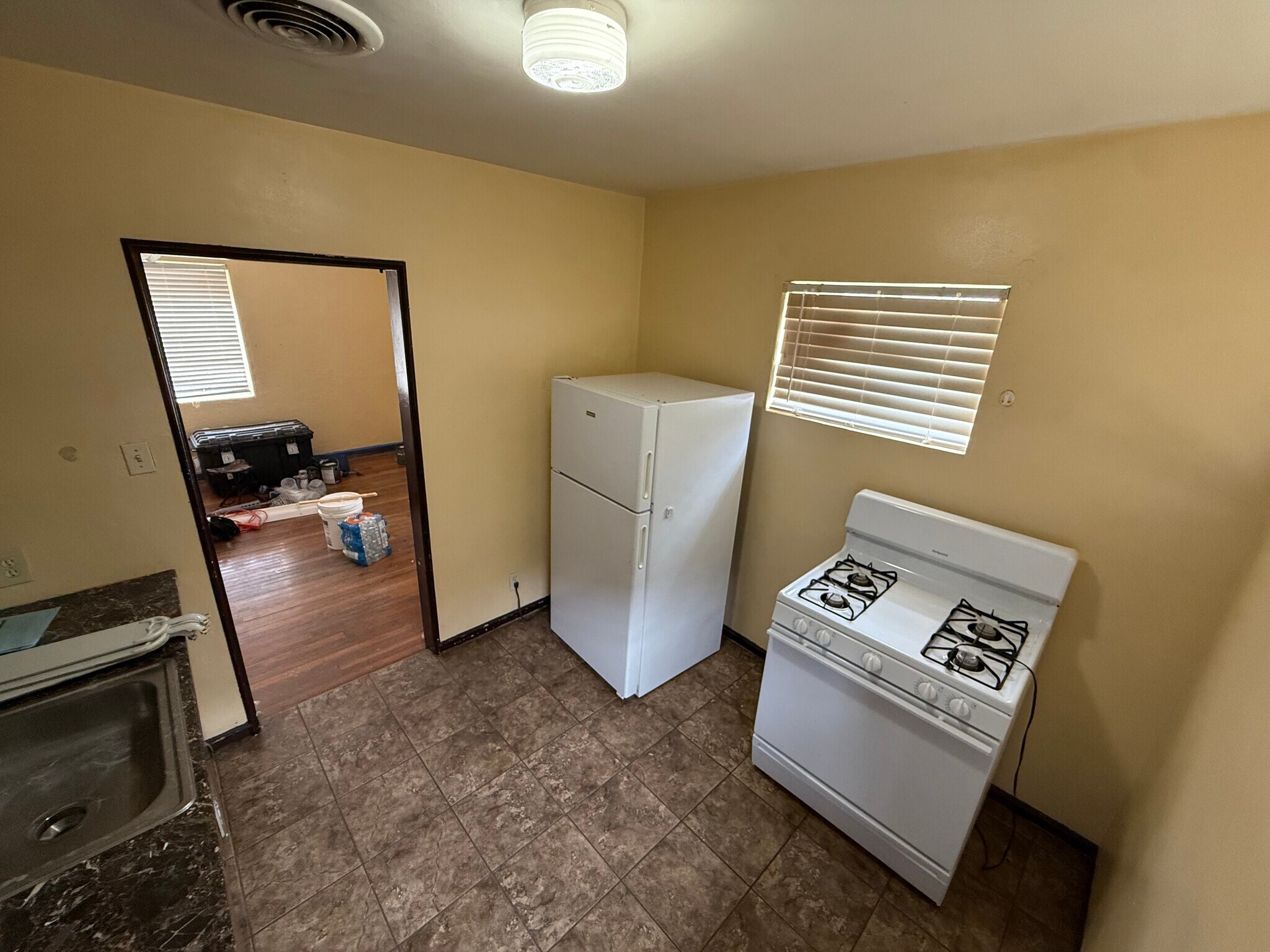 Kitchen looking into living room - 2527 Fort Blvd