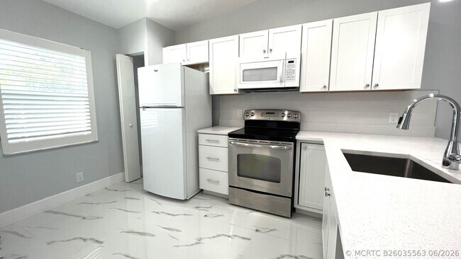Building Photo - 8743 Rheims Rd