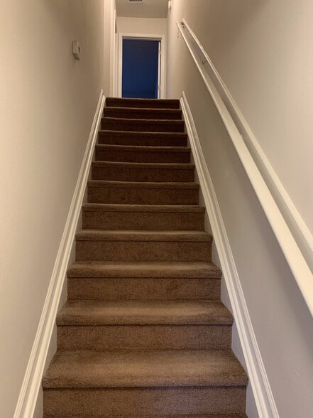 Stairs to upstairs bedroom - 389 Scrub Jay Dr