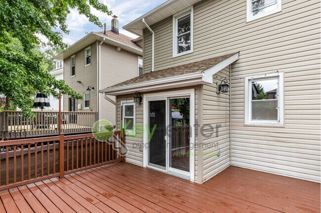Building Photo - Spacious 3BR Home with Finished Attic, Fenced Yard & Easy NYC Commute – No Broker Fee