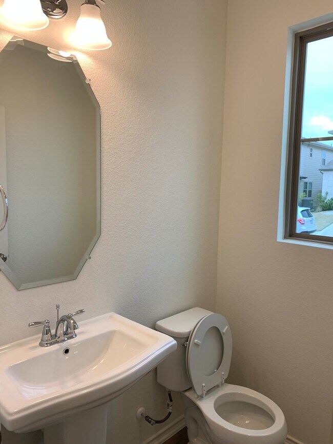 Building Photo - Home in The Village at Wells Branch
