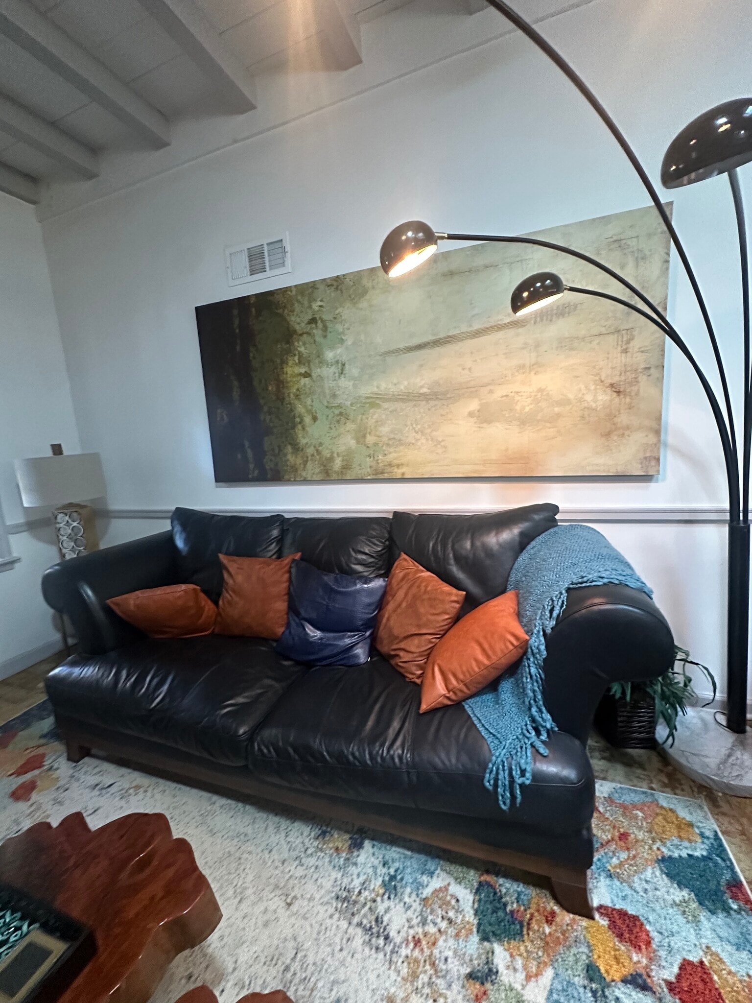 Evenings made better — cozy light, soft leather, and no plans at all. - 5460 Scofield Rd