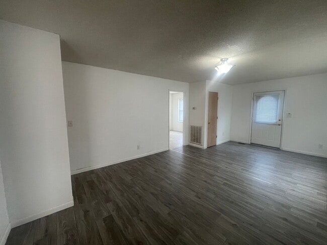 Building Photo - Brick Ranch- Dunn- 4 bedroom 2.5 bath- 2 car carport- Corner Lot