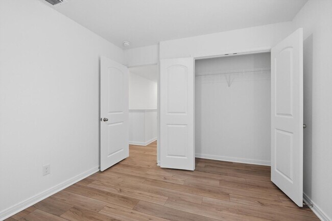Building Photo - Clean & Modern Townhome with No Carpet and Lawn Service Included