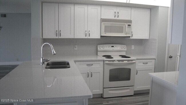Building Photo - 3873 S Banana River Blvd
