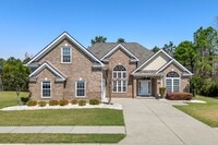 Building Photo - Spacious 4BR/3BA Home in Myrtle Beach – 2,550 Sq Ft & Screened Porch