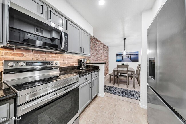 Building Photo - 8787 E Mountain View Rd