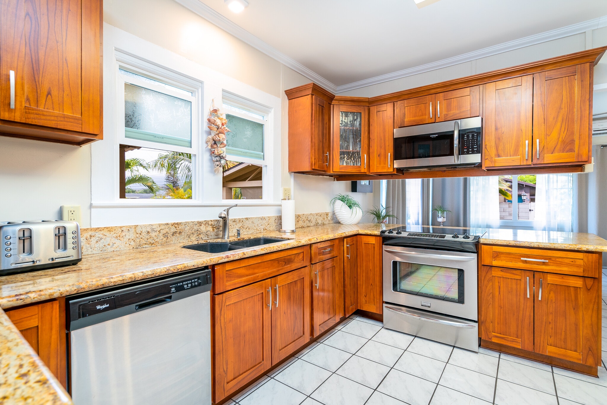 Appliances include stove (brand new), refrigerator (brand new), and dish washer. - 408 N Kainalu Dr