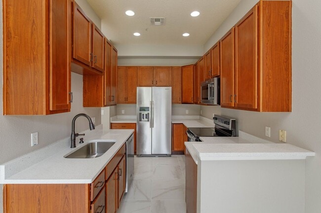 Building Photo - Spacious 4-Bedroom, 2.5-Bathroom Townhome with Modern Finishes and Community Amenities!