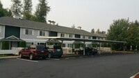 Building Photo - MOVE IN SPECIAL $500 OFF MOVE IN COSTS.  Emerald Court 2 bedroom 1 1/2 bath. 1 carport Puyallup T...