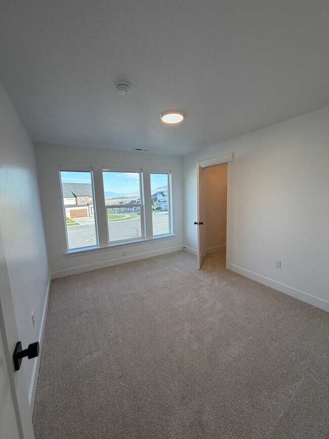 Building Photo - Spacious Family Home with Modern Upgrades