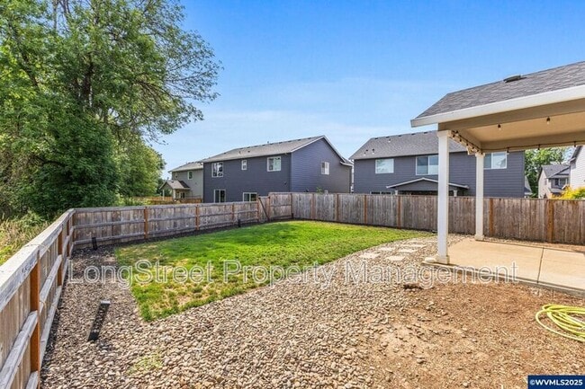Building Photo - 7177 SE Sarah Dr