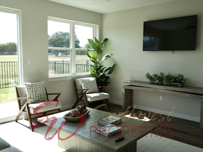 Building Photo - Upgrade your living experience across from campus in this fully furnished 3 bedroom 2.5 bath!