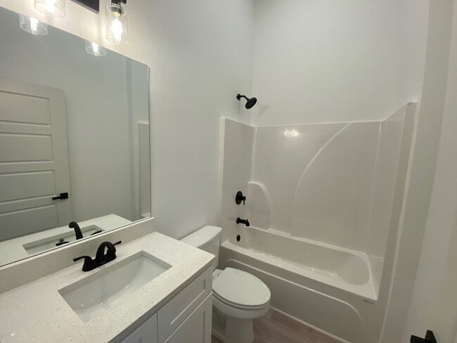 Building Photo - NEW CONSTRUCTION 5 BEDROOM PRE-LEASING FOR...