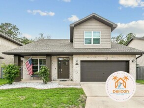 Building Photo - "Spacious 4-Bed Oasis with Granite Elegance in Navarre – 2,062 Sq. Ft. of Pure Comfort!"