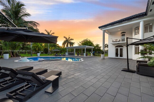 Building Photo - 5801 Melaleuca Rd