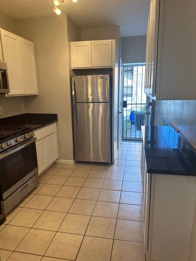 Building Photo - Newly Renovated! Hardwood Flooring First F...