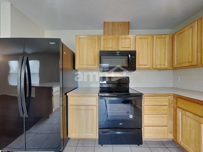 Building Photo - 6651 S Acacia Ave