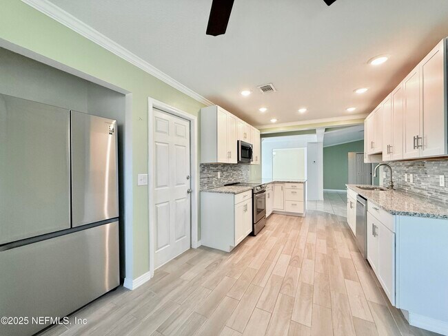 Building Photo - 10373 Windfern Ct N
