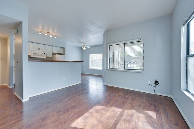 Building Photo - NW!! Gated!!! Clubhouse!!!Community Pool!!! 1st Floor Condo!!! Wood like floors!! No Carpet!!