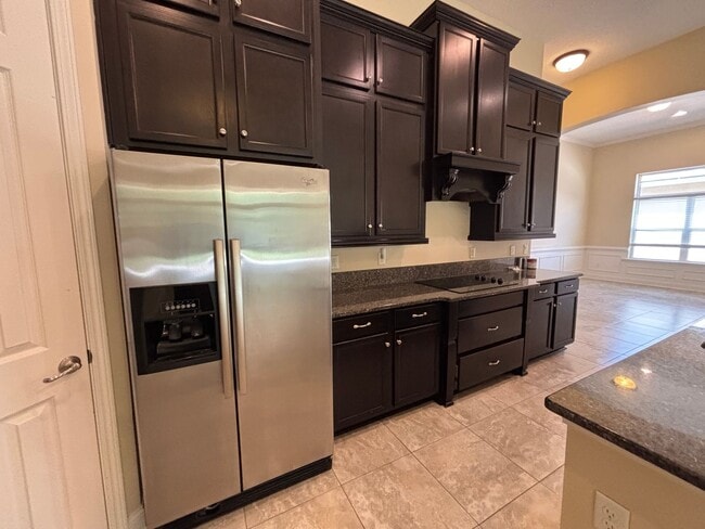 Building Photo - Spacious 4BR/3BA Home with 3-Car Garage, Bonus Office & Covered Patio in St Johns!