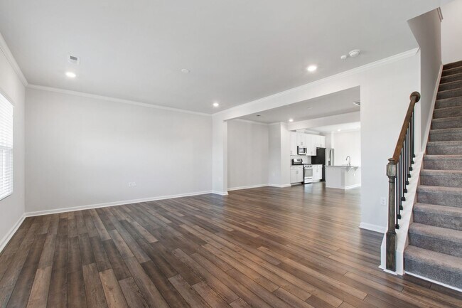 Building Photo - Bright, Spacious & Move-In Ready Townhome ...